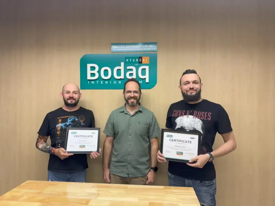 Newly certified Bodaq installers holding their certificates
