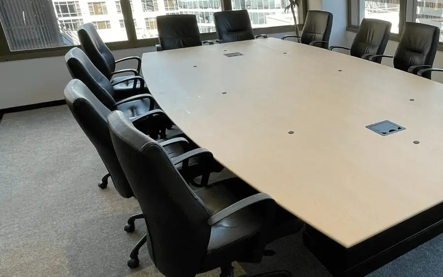 Boardroom table refinished in SPW43 Light Oak film